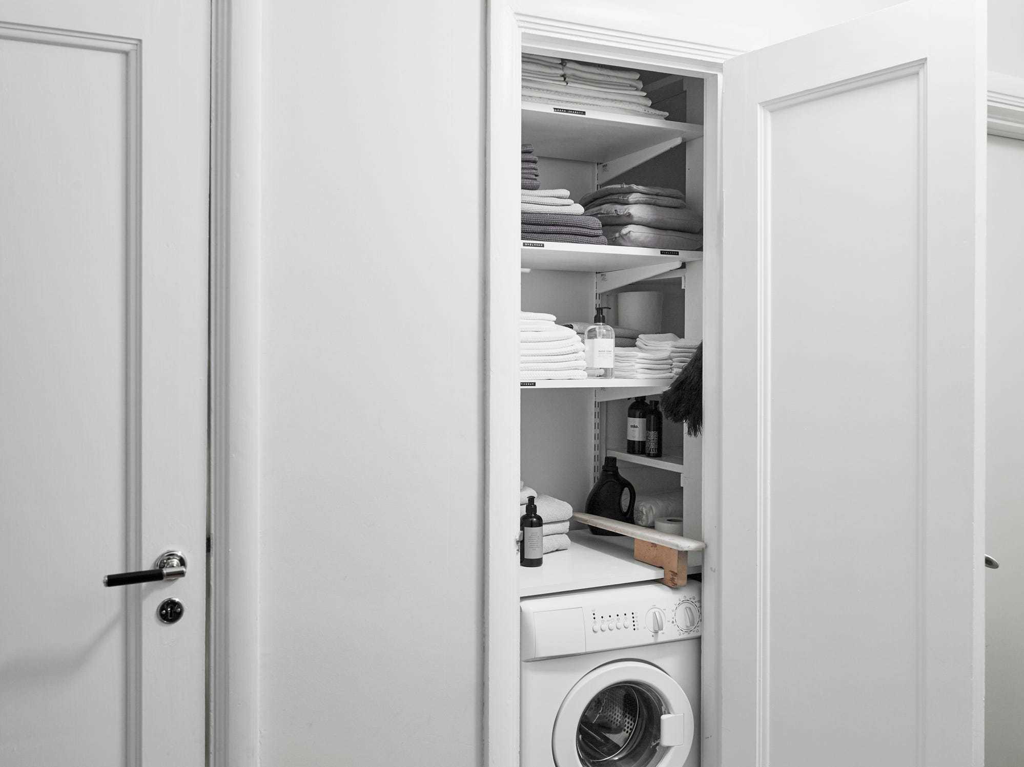 Wide shot of a laundry closet.