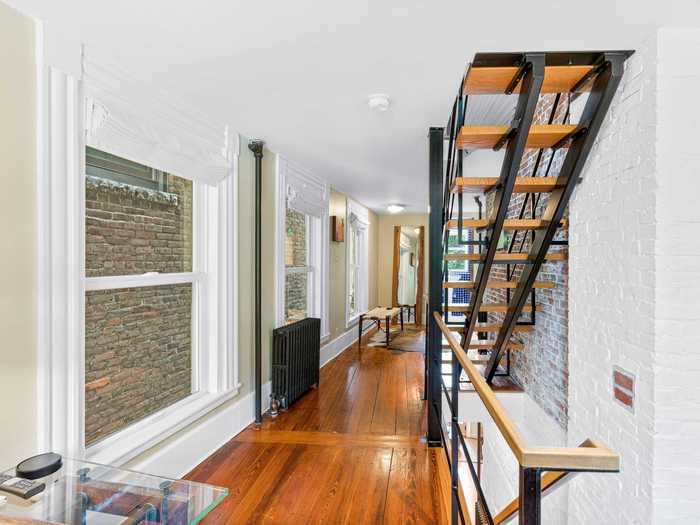 The windows in the hallway on the second floor face a brick wall of the property next door.