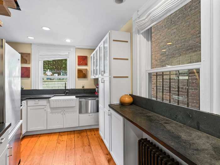 Despite its small size, at just over 1,000 square feet, the two-bedroom home has a full-sized kitchen on the first floor, according to its listing on Zillow.