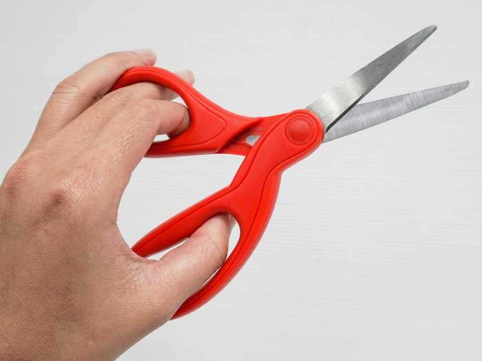 This is what it looks like when a lefty tries to use right-handed scissors.