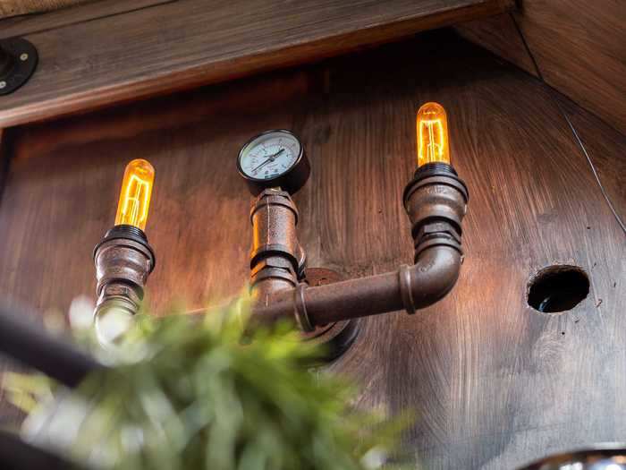 The boat has industrial-style light fixtures.