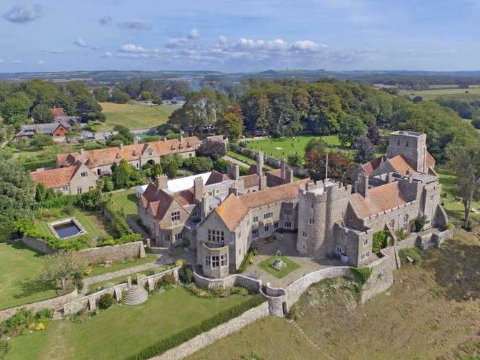 Despite its high walls and iron-clad gates, the castle is only a short distance from the nearby village of Lympne.