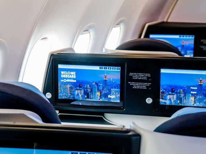 Each seat has a seat-back entertainment system with high-definition displays.