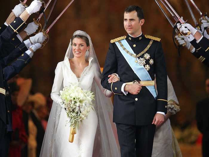 Queen Letizia of Spain chose a Manuel Pertegaz wedding dress for her 2004 marriage to King Felipe that also featured a statement collar.