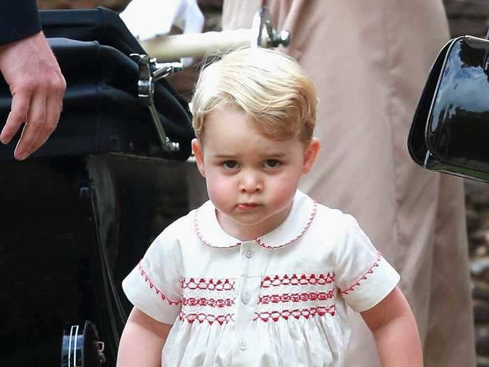 George wore red shorts and a white shirt with red embroidery, a nearly identical outfit to one William wore as a toddler in 1984.