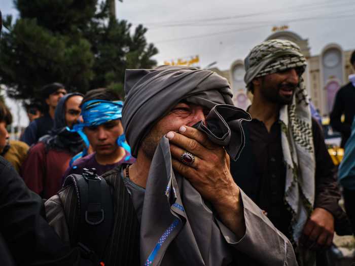 Yam said Afghans were waiting outside the airport to "try their luck" and get on a flight out of the nation, which is now under Taliban control.