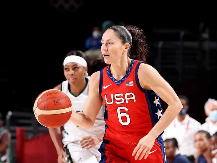 Sue Bird dribbles up the floor and looks to make a pass.