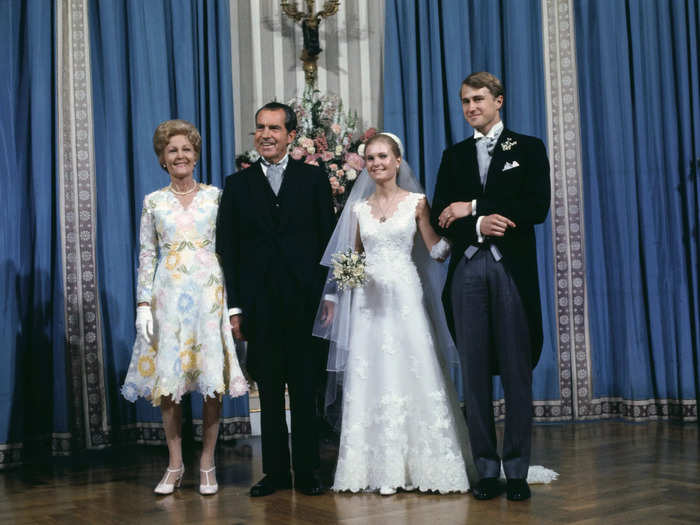 Tricia Nixon wore a white silk organdy gown designed by Priscilla Kidder for her 1971 wedding to Edward Finch Cox.