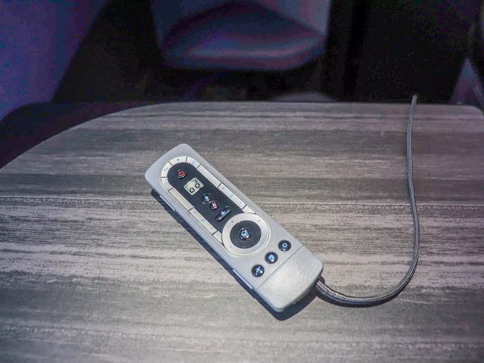 A tethered remote was available to control the system, complete with a game remote on the flip side.
