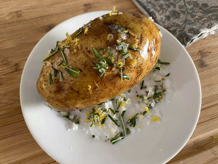 The process involved rolling the baked potatoes in a salt mixture.