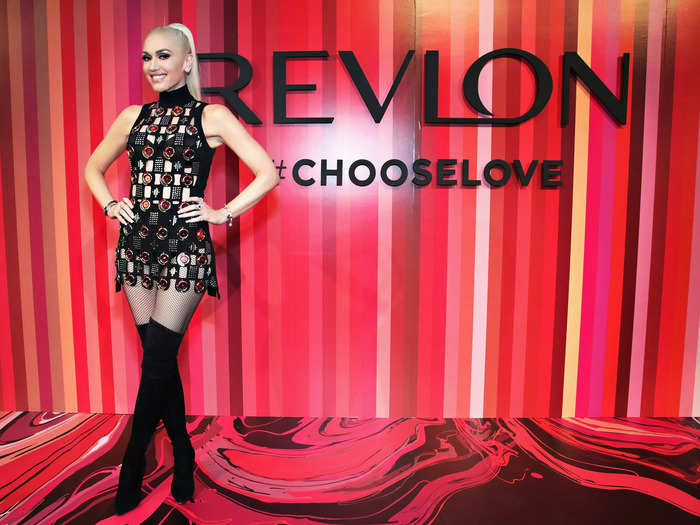 For a 2017 Revlon event, Stefani wore a high-neck minidress with metallic geometric cutouts and thigh-high boots.