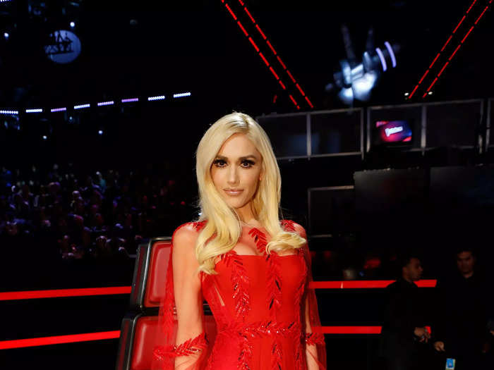 Stefani then changed into a stunning red dress that had a sheer skirt and sleeves during the season nine finale of "The Voice."