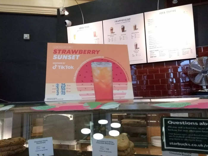 There was a big sign on top of the counter advertising Starbucks