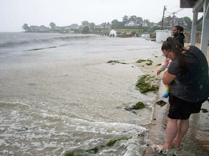 Beach water extends far out onto the shore in Connecticut