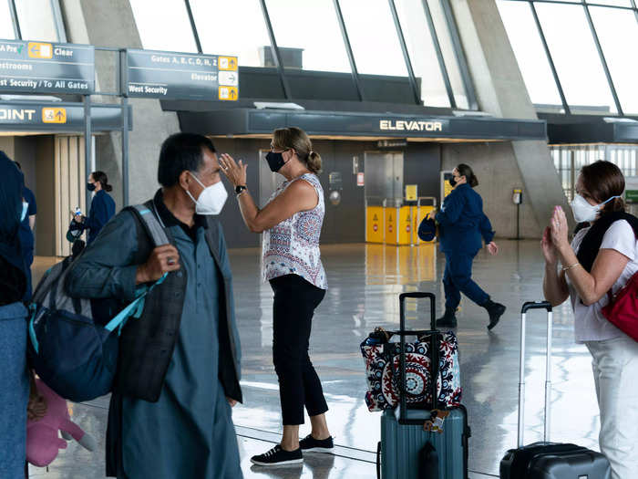 But some Afghan refugees arrived at Washington Dulles International Airport in Virginia on Wednesday. Americans applauded their arrival to safety.