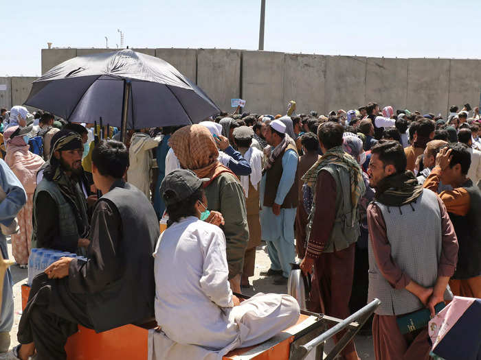 Some Afghans went hours without food or water while waiting for escape flights.