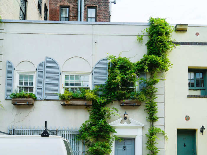 Some of the Washington Mews dwellings are worth millions. This two-bedroom home with light-blue shutters is estimated to be worth over $5 million at the time of writing, according to Trulia.