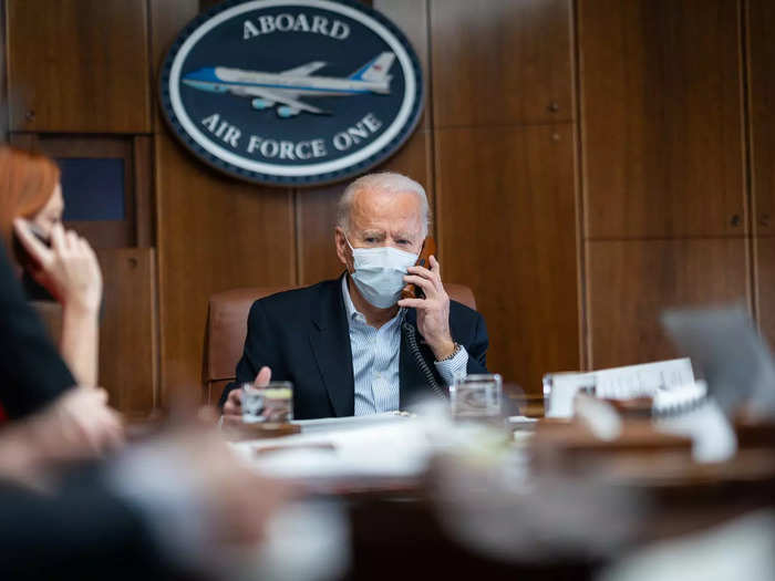 The placard in the conference room has been updated to read "Aboard Air Force One" with an image of the iconic aircraft.