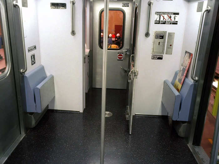 The new cars had wider doors, according to the same article, and flip-up priority seating, according to the subway