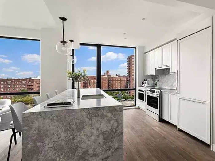 The kitchen is outfitted with stainless steel appliances.