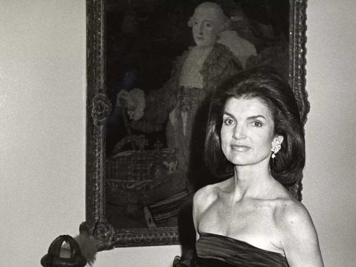 A few years later in 1979, Jackie Kennedy Onassis walked past some art while at the gala.