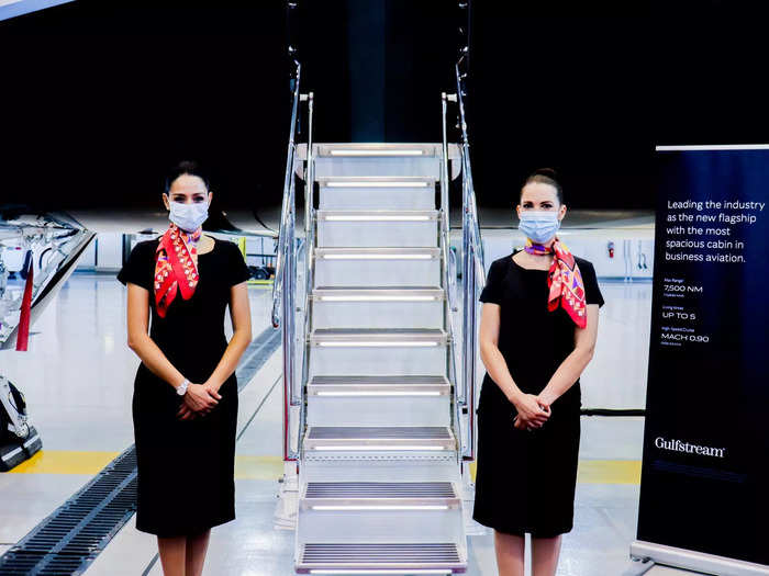 Climbing on board the aircraft, airstairs are positioned so that passengers ascend directly into the plane instead of up to the main door. Lighted steps guide the way, with handrails on each side.