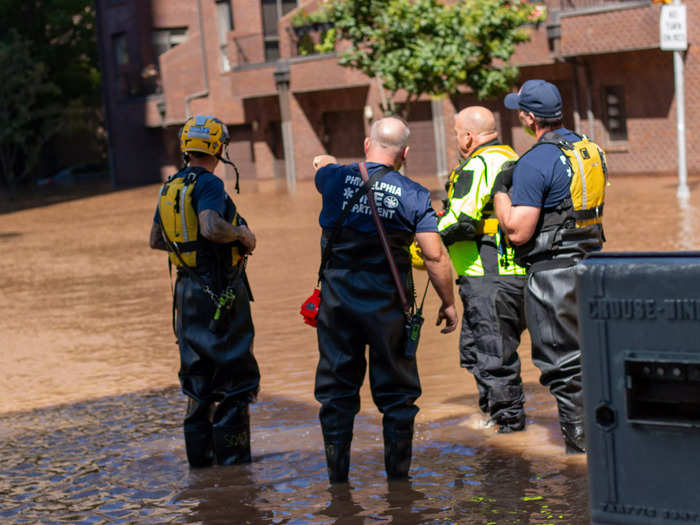 Firefighters worked all morning to clear the streets.