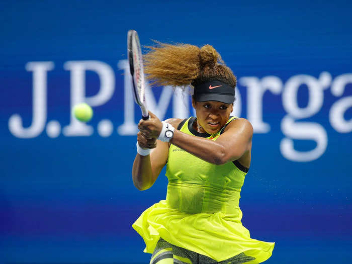 8/30: Naomi Osaka smashes a shot during her first-round match at the US Open.