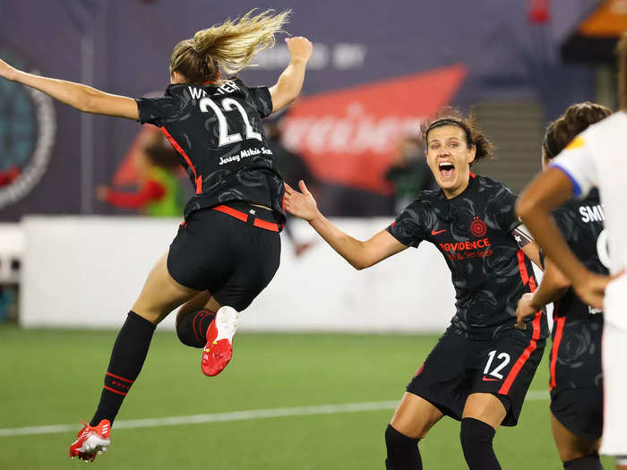 8/21: Portland Thorns stars Morgan Weaver (left) and Christine Sinclair celebrate their team