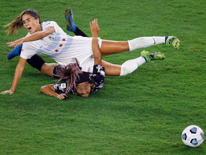 8/18: Yuki Nagasato of Racing Louisville and Katie Johnson of the Chicago Red Stars battle for a ball during an NWSL game.