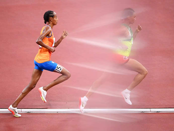 8/7: Dutch runner Sifan Hassan chases an opponent in the 10,000m final at the Tokyo Olympics.