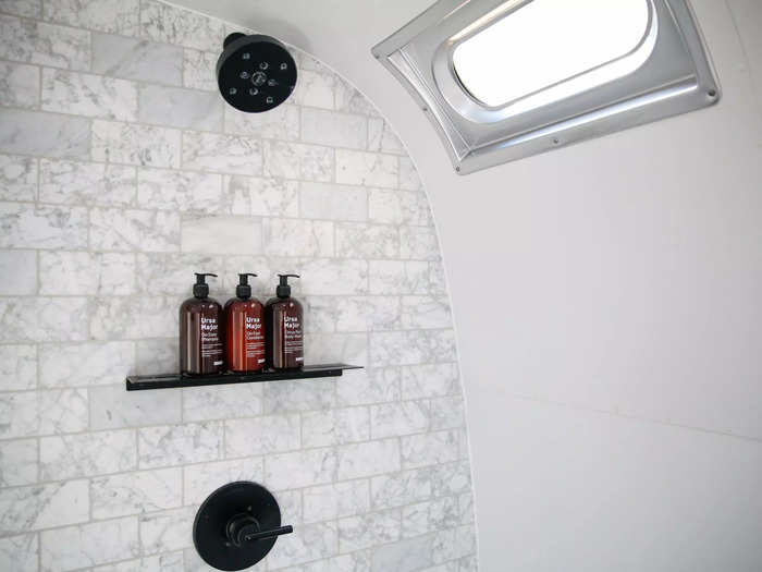 All of the bathroom products - specifically the lotion, hand soap, shampoo, conditioner, and body soap - are supplied by Ursa Major inside amber bottles.