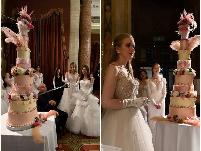 With no monarch to curtsey to, debutantes now do so in front of something slightly different: an eight-foot cake baked in honor of Queen Charlotte.