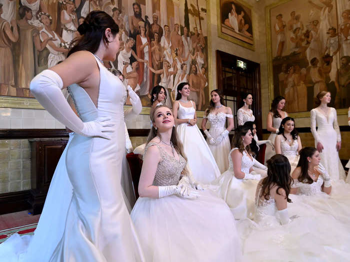 For over a hundred years, debutantes attending the ball were introduced to society in front of the reigning monarch.