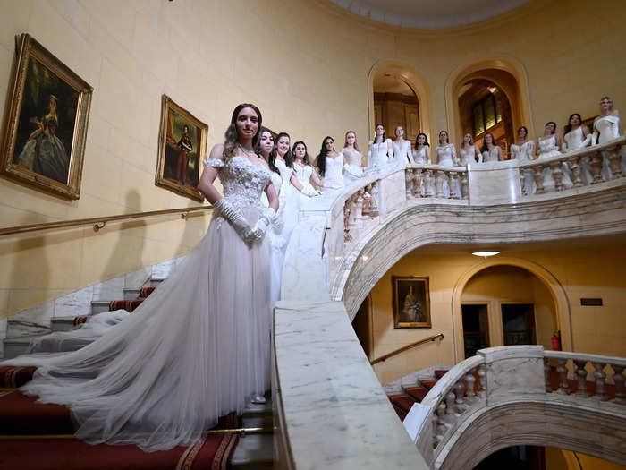 The ball is hosted by The London Season, a non-profit, in partnership with Harrods. Each debutante gets a complimentary white couture gown, jewelry, and hairdressing on the big day.