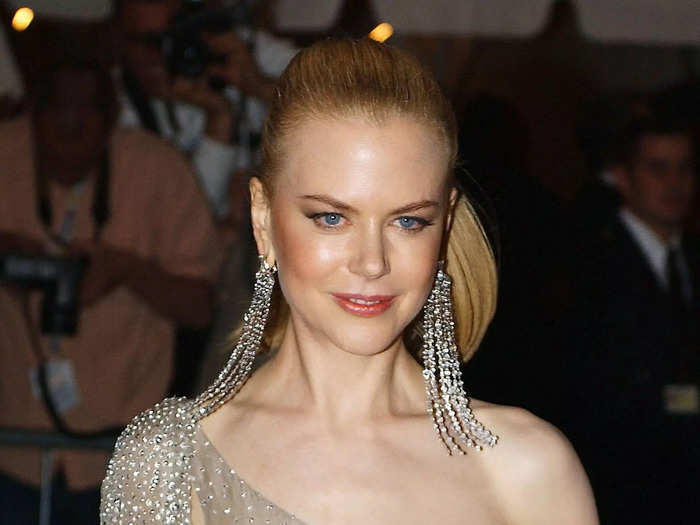 For the 2003 Met Gala in April, she wore this semi-sheer, sparkly, one-shoulder gown and giant diamond earrings.