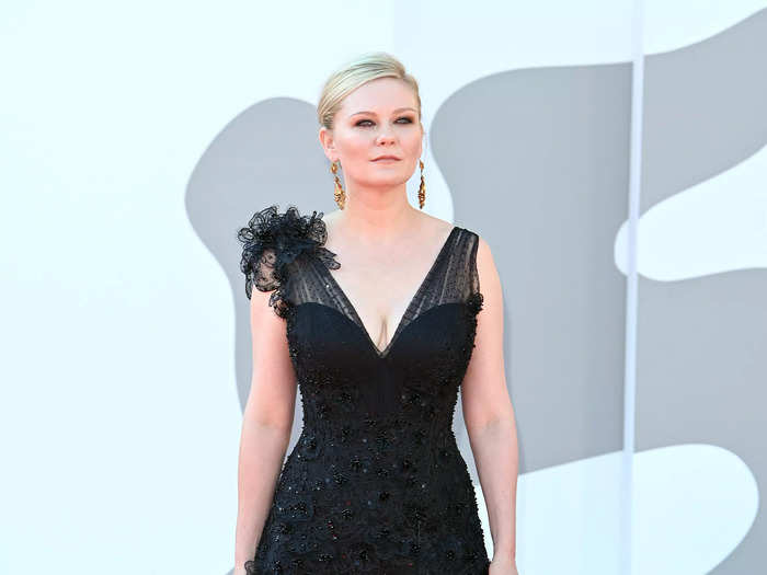 For the premiere of "The Power of the Dog," Kirsten Dunst wore a dress with floral details and a sheer skirt.