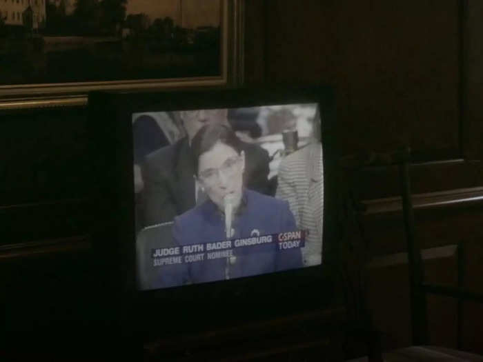 A scene taking place in July 1993 shows the late Supreme Court justice Ruth Bader Ginsburg on TV at her confirmation hearing.