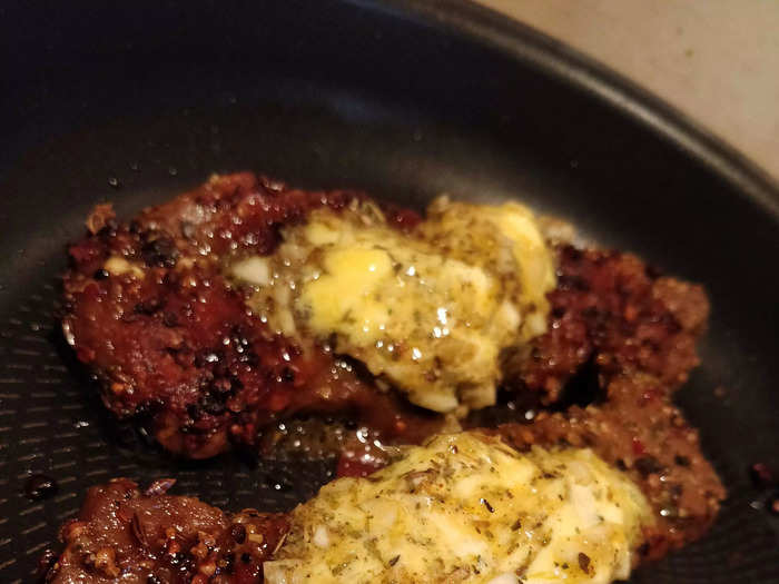 I made some garlic butter and topped the steak while it cooked. It looked so tasty sizzling in the pan, and I couldn