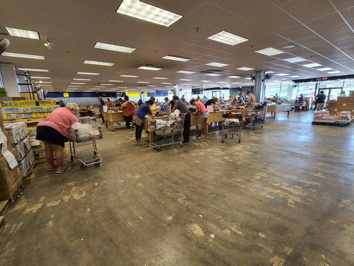 Inside, the store was pretty bare bones, with a number of aisles of wooden troughs. These structures contained everything from food to apparel to unclaimed parcels.