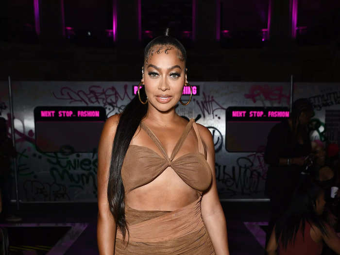 La La Anthony wore a multi-tone brown dress to the PrettyLittleThing: Teyana Taylor Collection II fashion show.