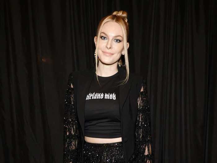 "Real Housewives of New York" star Leah McSweeney attended the Christian Siriano fashion show in see-through fringed pants and a matching jacket.