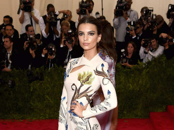 Emily Ratajkowski made her first Met Gala appearance in a long-sleeved cream dress with a bold print in 2015.