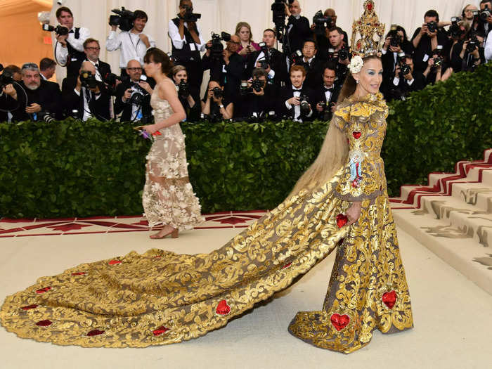 Parker pulled out all the stops for her 2018 Met Gala appearance, sporting a gold brocade dress with a flowing train.