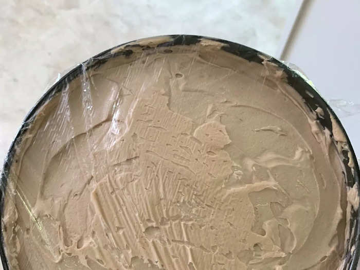 I smoothed the top of the cake with a spatula and covered it with plastic wrap.