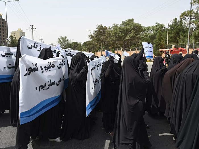 Most women at the rally were covered head-to-toe.