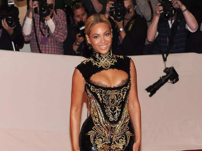 In 2011, Beyoncé looked chic in a custom Emilio Pucci mermaid gown with gold embroidery and a high neckline.