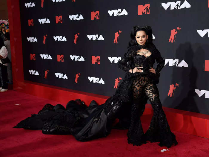 Bella Poarch donned a see-through jumpsuit with a long train on the red carpet.