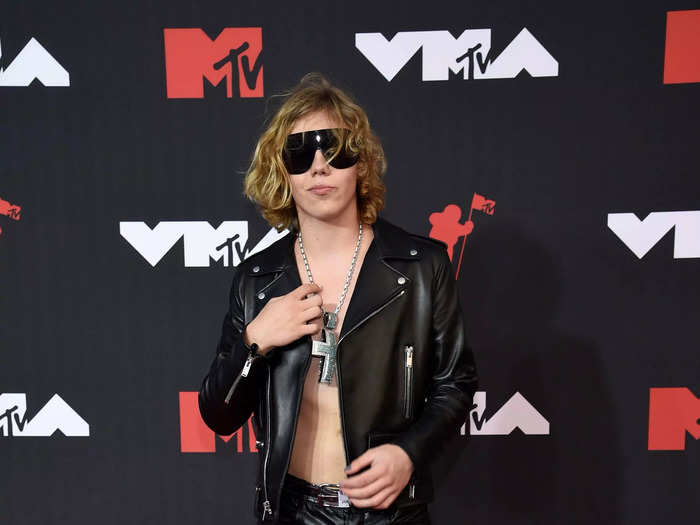 The Kid Laroi opted for a no-shirt look on the red carpet, and wore a massive cross in the center of his chest instead.