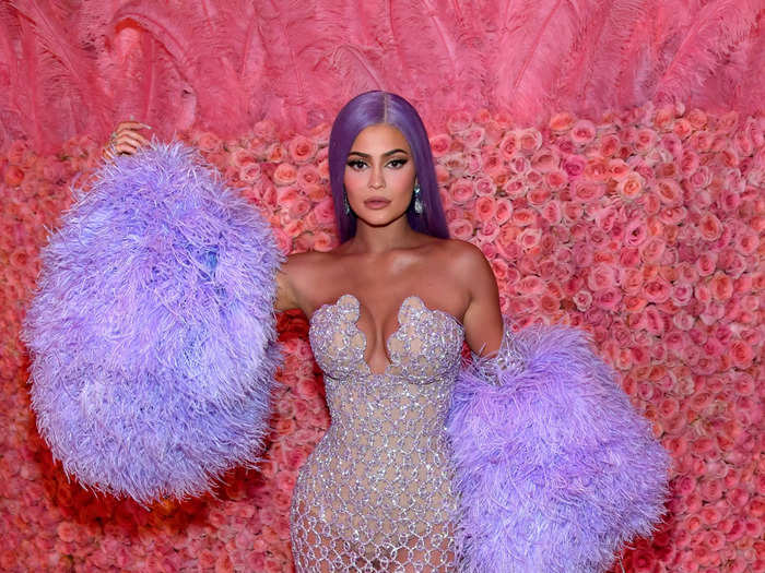 Kylie Jenner went for a similar vibe as Kendall in a lavender Versace gown.